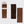 Three widths of Kit-sch wide lace elastic headbands in brown shades, with one headband still on its retail header card and two laid flat against a light gray background.