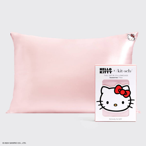 Kitsch, this satin pillowcase embroidered with Hello Kitty for a night of sweet dreams and adventures ● Helps to tame frizz & reduce breakage while sleeping by creating less friction ● Helps reduce breakouts by absorbing less moisture and dirt ● Helps to prevent facial creases from sleeping ● Gentle on skin, hair, eyelashes & eyebrows ● Stays cool all night ● OEKO-TEX® Certified: This certifies that our satin is safe, sustainable, and environmentally friendly ● Includes 1 Queen/St