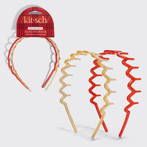 Three Kit-sch Zluzag headbands with a red and gold plaid pattern, shown both on their retail packaging and as a set of three on a light gray background.